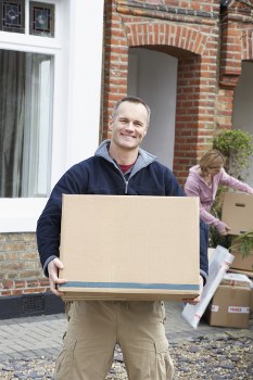 Moving boxes and furniture ready for a home move in London