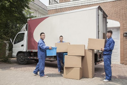 Local London removal team planning a residential move in a city street