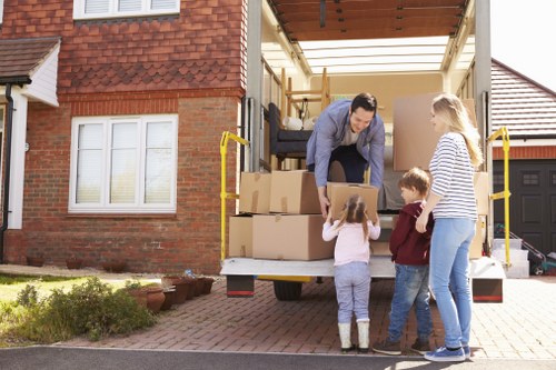 Man and van team loading furniture for a London move
