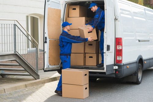 Careful unpacking of boxes in a London property