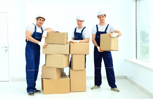 Removal team using safe handling practices during a property move