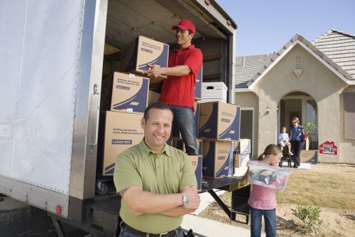 Man with a van loading furniture for a London move