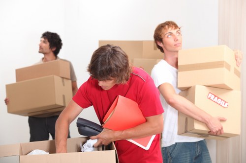 Household boxes and furniture prepared for a London move