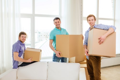 Local movers organising packing for a flat in London