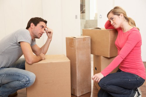 Furniture and boxes being loaded into a moving van
