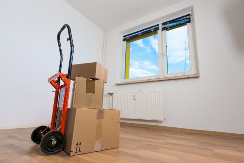 Packed boxes and furniture ready for a local removals service in London