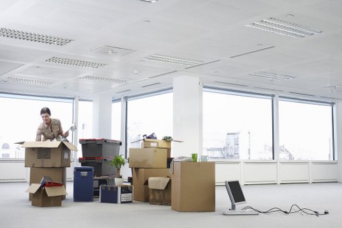 Packed boxes and furniture ready for removal truck hire in London